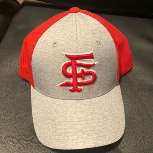 It’s red and grey never been worn before in really good condition